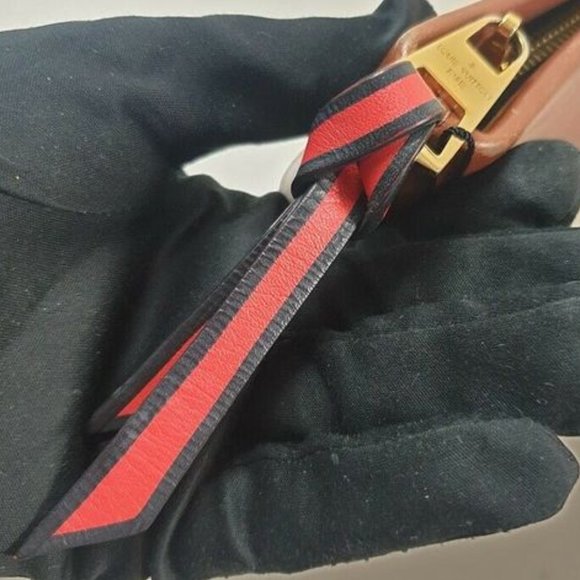 LOUIS VUITTON Pochette Tuileries Monogram Caramel Rouge - Picture 9 of 13